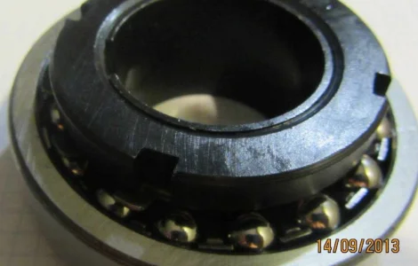 Подшипник шариковый двухрядный 11205 - ( 1206К + Н206 ) - ХАРП