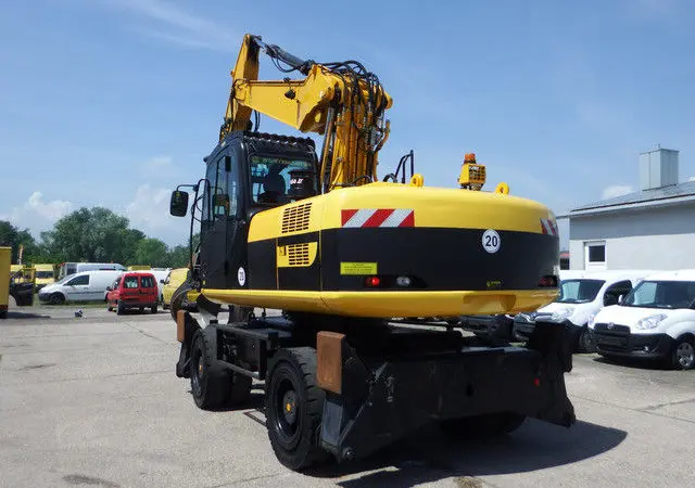 Колесный экскаватор JCB JC 200 W - фото № 5