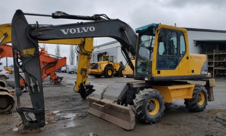 Колесный экскаватор Volvo EW 140 B. Колесный экскаватор Volvo б/у - фото № 1