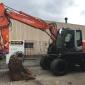 Колесный экскаватор Hitachi ZX 140 W-3 - фото № 1