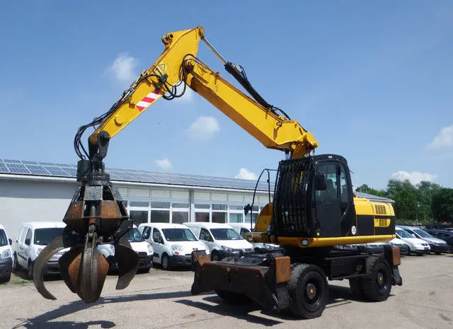 Колесный экскаватор JCB JC 200 W- фото № 1