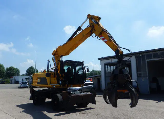 Колесный экскаватор JCB JC 200 W- фото № 2