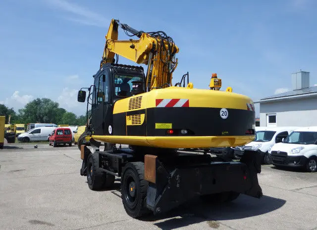 Колесный экскаватор JCB JC 200 W- фото № 5