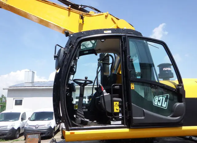 Колесный экскаватор JCB JC 200 W- фото № 7