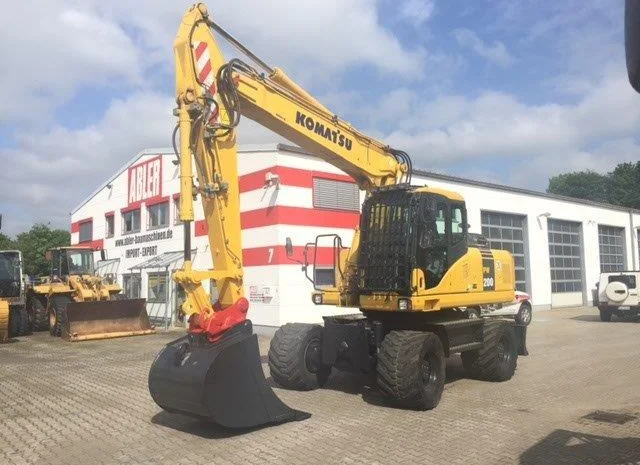 Колесный экскаватор Komatsu PW200- фото № 11